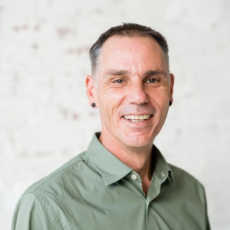 smiling practitioner mark payne