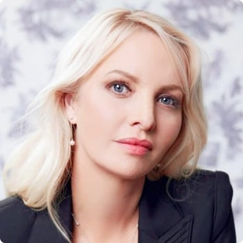 dr-jemma-king-phd front profile young woman soft lighting wearing suit blonde hair