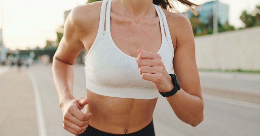 metabolic-health woman running white sports crop top fit physique