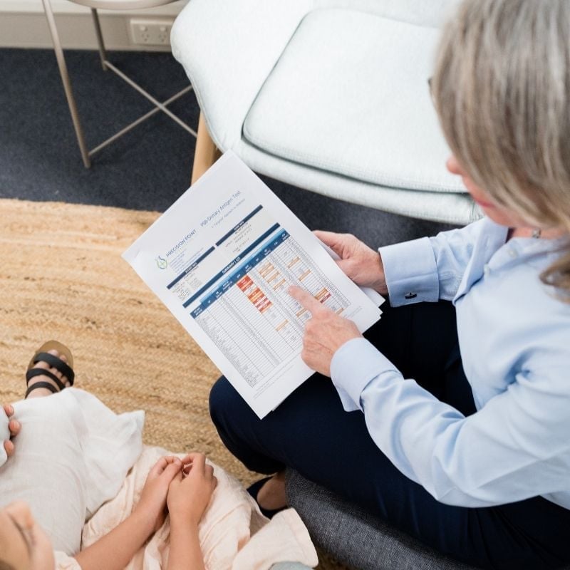 A functional medicine doctor looking over a Precision 88 test report