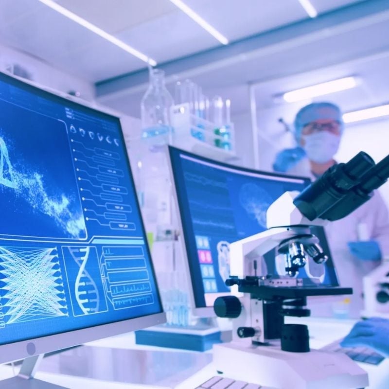 A picture of a lab computer screen and microscope at TruAge